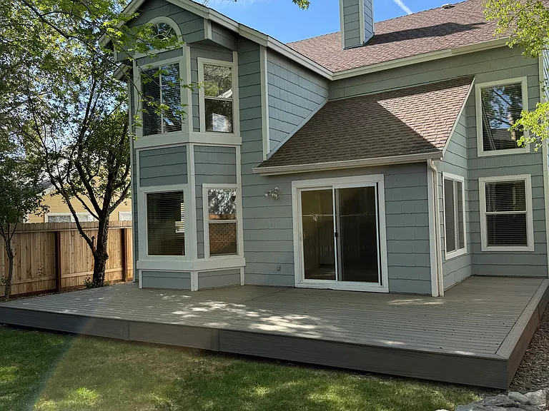 REAR VIEW WITH YARD