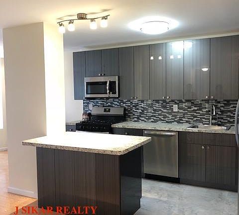 2nd image of 501 Surf Ave E #2E