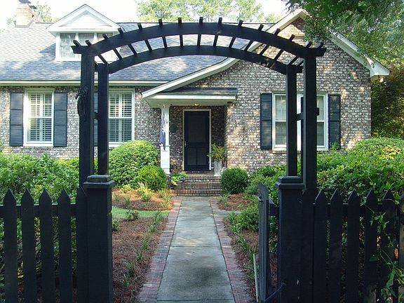 Four foot picket fence w/ arbor