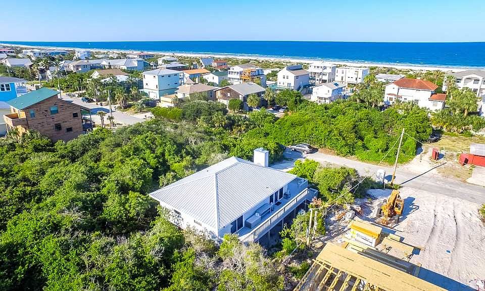 Don't let this cute beach side getaway pass you by.  Furnished and ready for long summer days spent by the beach!