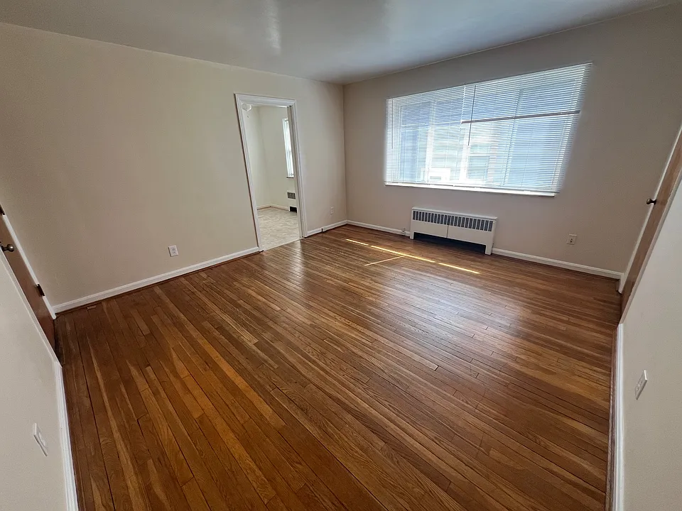 Living room heading toward kitchen