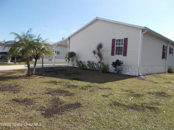 801 Lychee Dr, Barefoot Bay, FL 32976