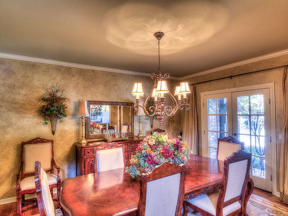 A seven piece dinette set fits comfortably in the formal dining room but the space can accommodate a