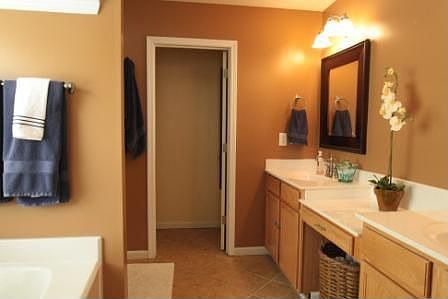Master bath with dual vanity, garden tub, sep shower