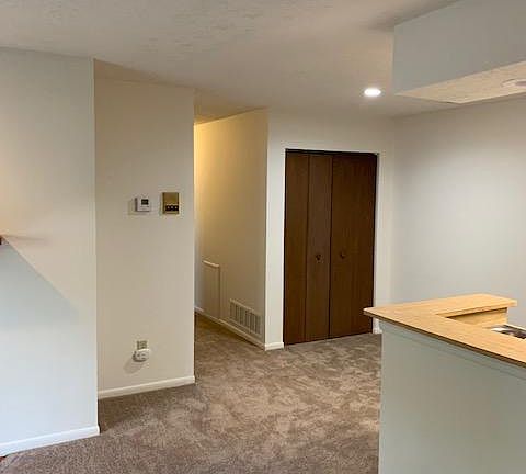 Eat in dining area- behind brown doors is the furnace and hot water tank