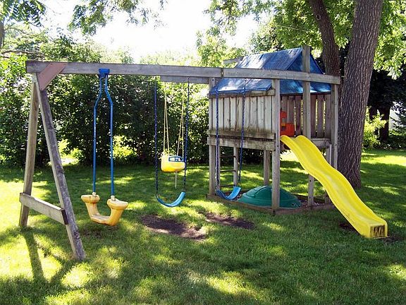 Wooden Swing Set included