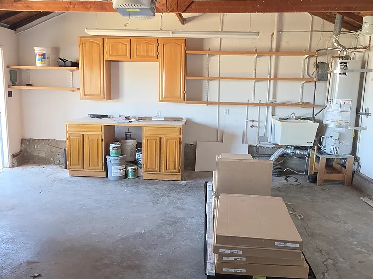 Two car Side by Side Garage with Storage and shelving