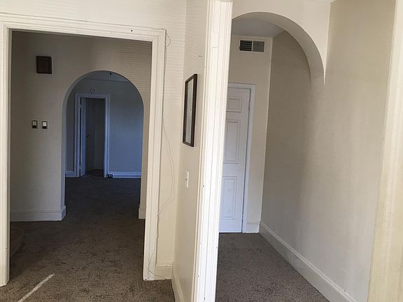 View of Living room, foyer entrance and dinning room
