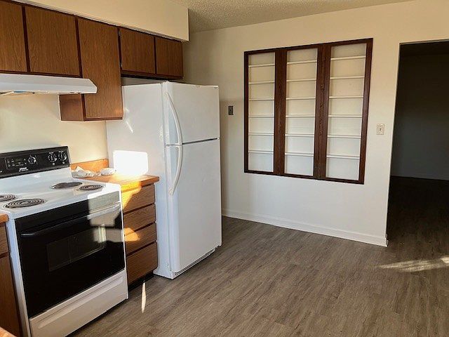 Eat in kitchen with open pantry shelves