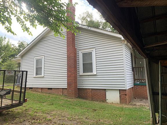 side yard with non function Fireplace