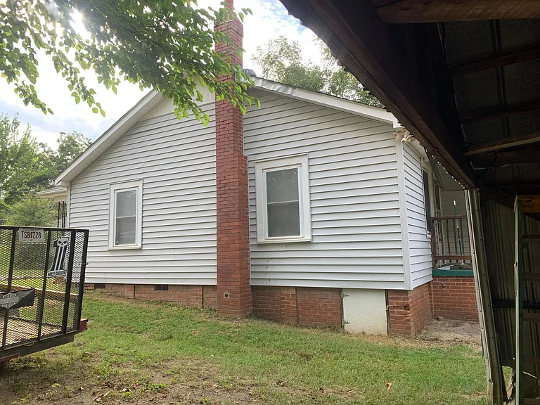 side yard with non function Fireplace