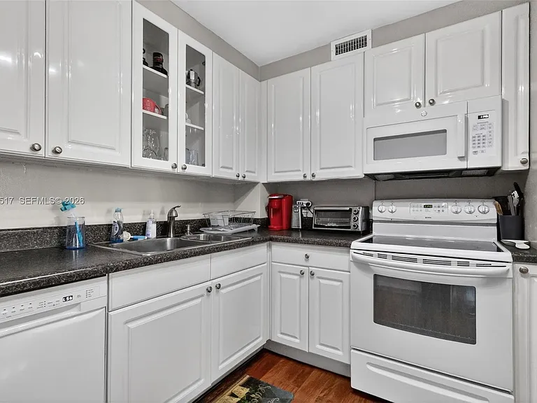 401 Golden Isles Dr #208 — Photo 9