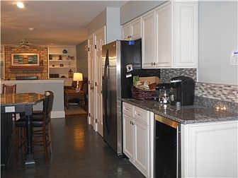 Alternate view of kitchen, lots of extra space