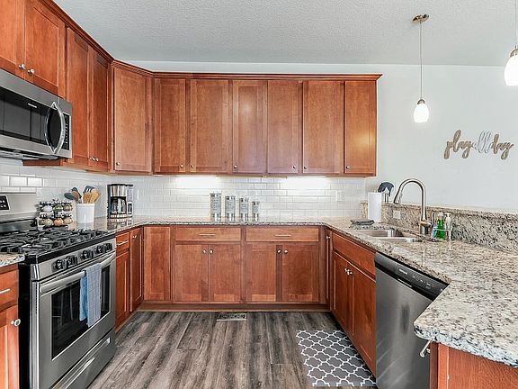 Open style kitchen for hosting and entertaining. Gas stove for cooking and fully stocked kitchen!