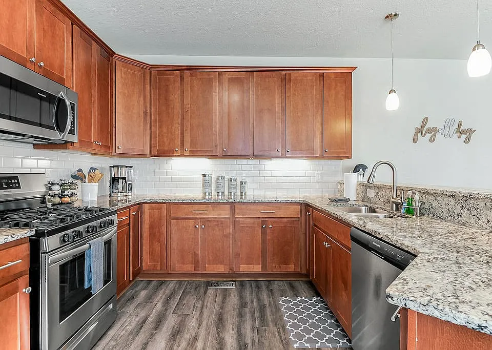 Open style kitchen for hosting and entertaining. Gas stove for cooking and fully stocked kitchen!
