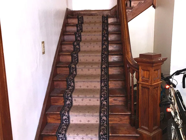 Stair in foyer to apartment
