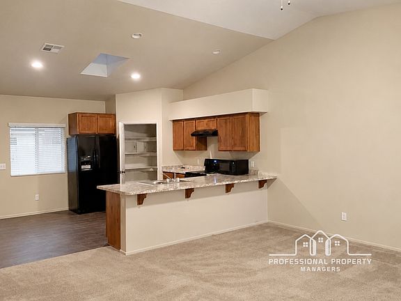 4th image of 7334 E 39th Pl