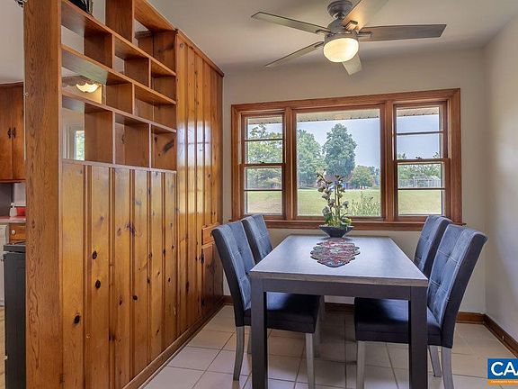 Cute dining area overlooks the yard + Burnley-Moran Elementary school