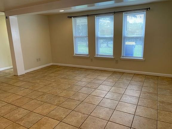 Living area extends to kitchen area