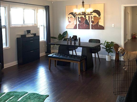 Sample of living view toward dining area as used by current tenant's (and their canine family member)