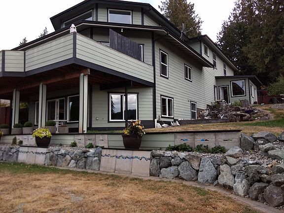 Front view of yard and decks