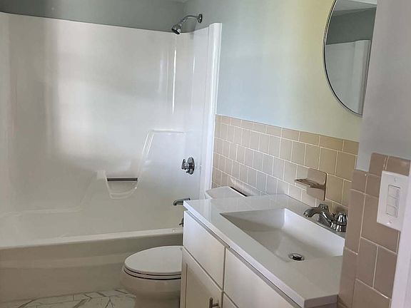 Bathroom
- New flooring
- New paint
- New lighting
- New plumbing fixtures