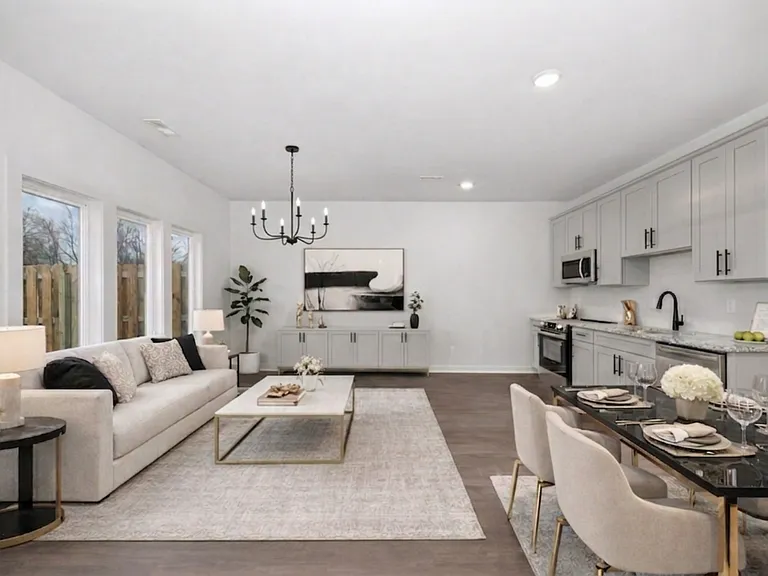 Designed for connection. An airy, open-concept space perfect for hosting dinner parties or unwinding