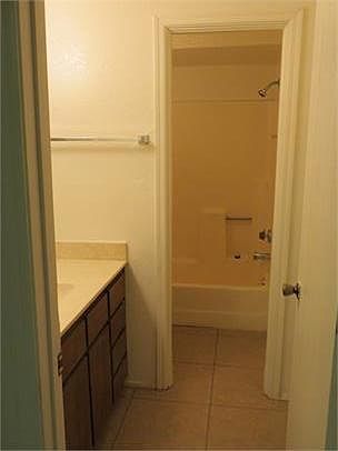 Bathroom. Sink is separate from tub and toilet.