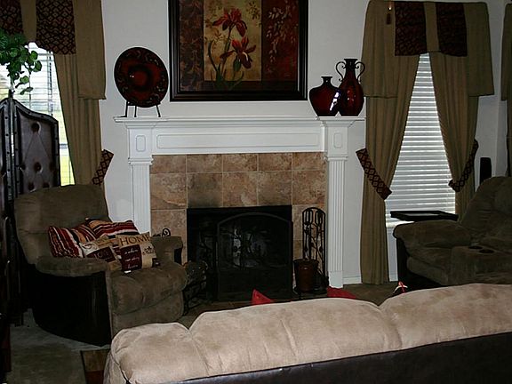 Warm and Cozy den with fireplace