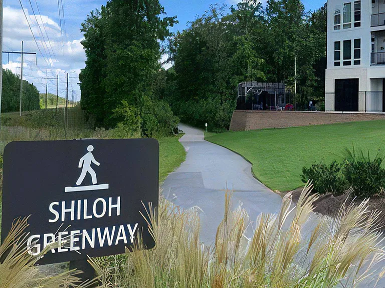 Peaceful Walking Path Along Shiloh Greenway Beside Residential Community