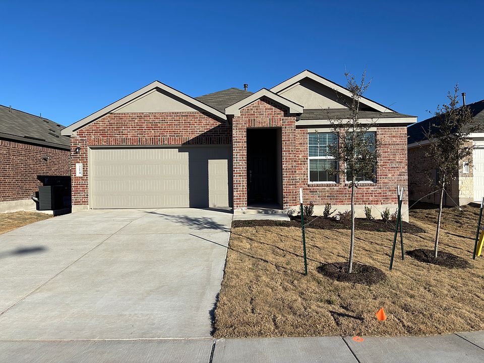 Beautiful brick exterior and a covered entry protected from elements!