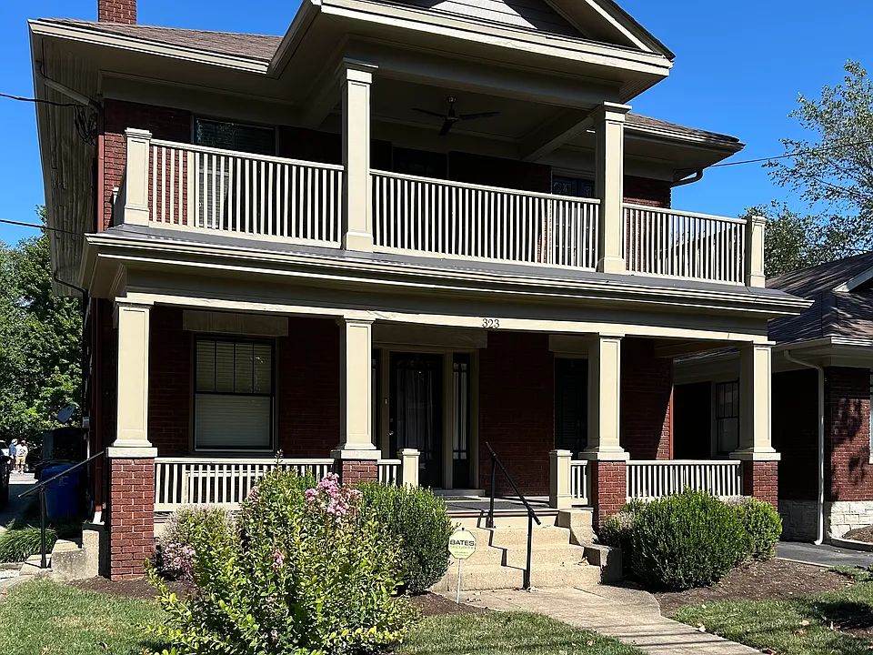 Great view of the front porch. Unit is on the second floor and is accessed by separate entrance. Back porch off the kitchen overlooks yard and garden.