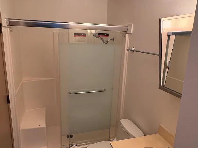 Master bathroom with brand new showerdoor