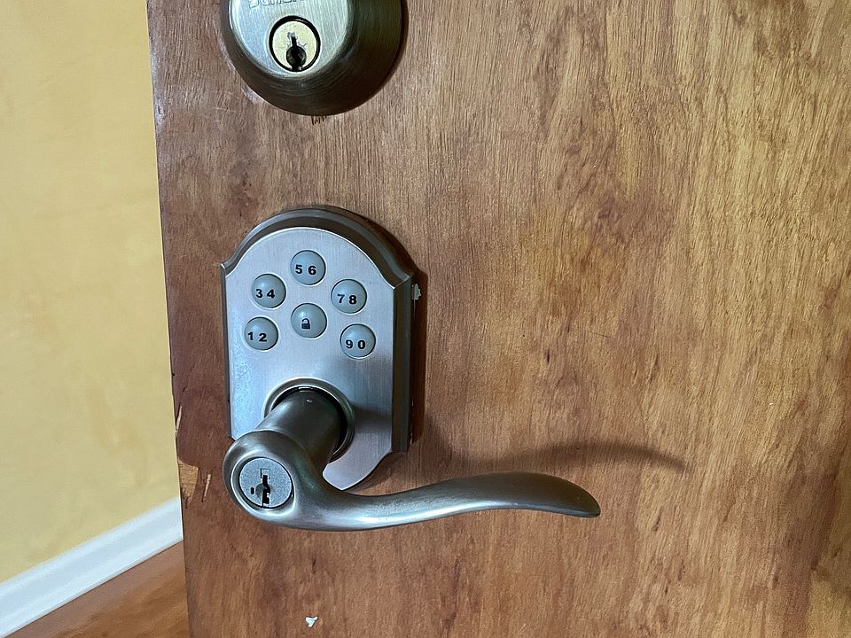 keyless entry and high security deadbolt on apartment door