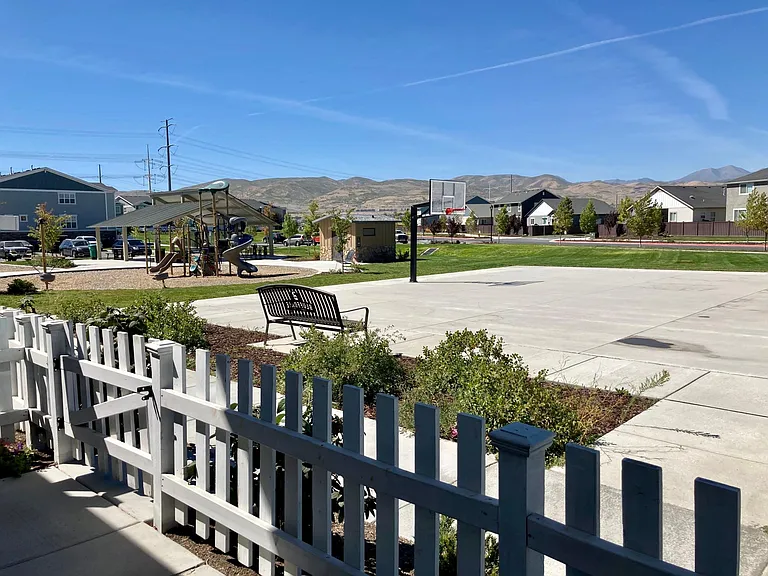 Front patio overlooks park and is a short walk to new schools.