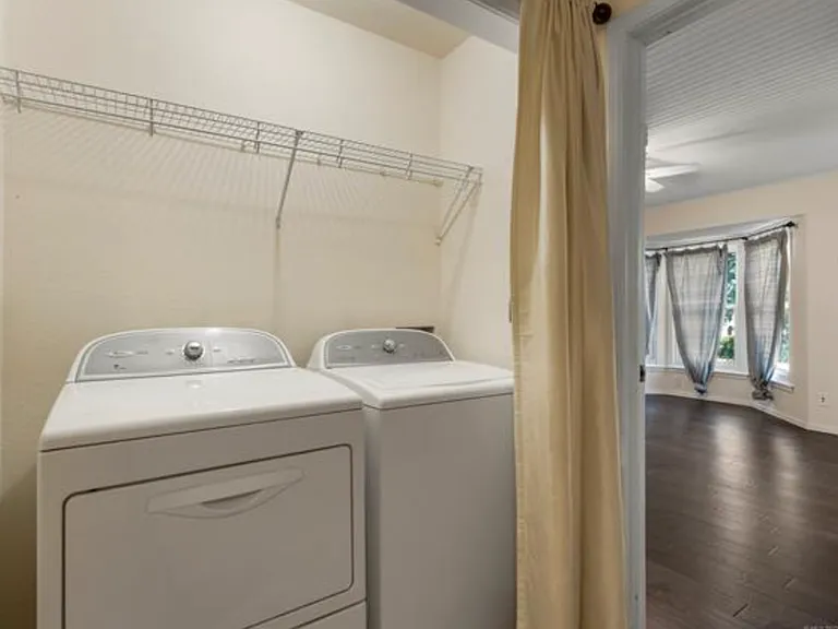 Washer and Dryer on top floor between bedrooms. Washer and Dryer stay