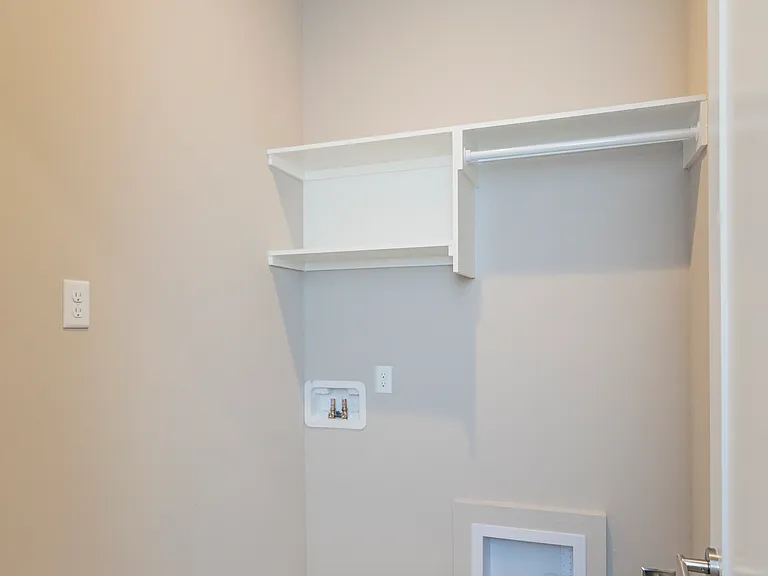 spacious laundry, washer and dryer included