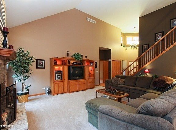 Family room with wood burning fireplace