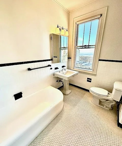 Unit #504 HUGE primary bathroom with separate bathtub and shower. The water VIEWS from the primary bathroom are GORGEOUS!