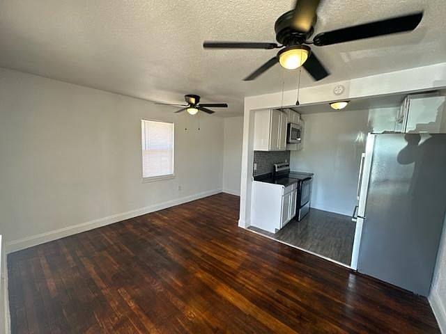 Open living area/kitchen/dining