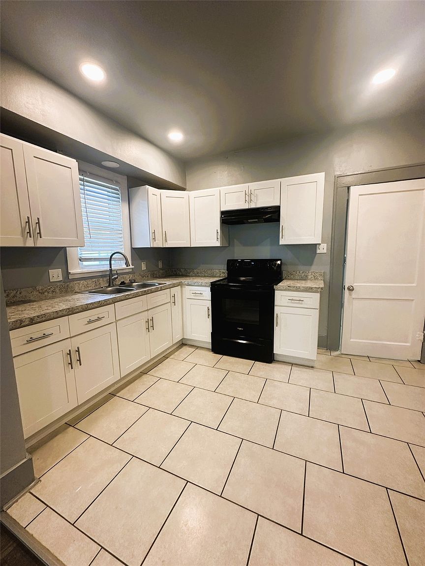 Spacious family home with kitchen and living area