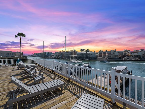 __ Outdoor pool overlooking the canal with stunning sunset views