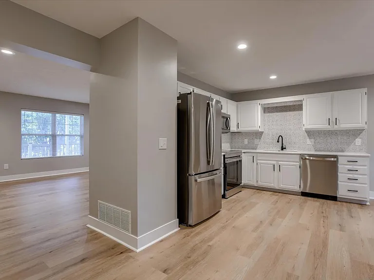 Kitchen to right, living room to left.