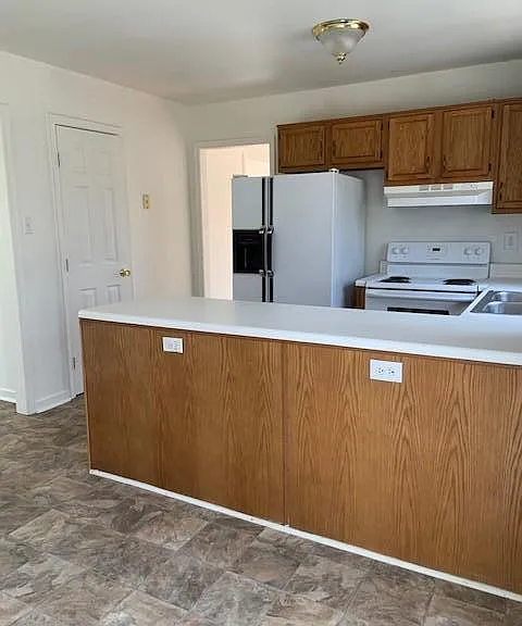 view from eat in kitchen, clean vinyl flooring