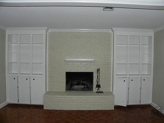 Den facing fireplace