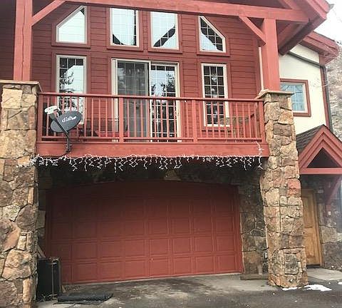 End unit with oversized 2 car garage and balcony