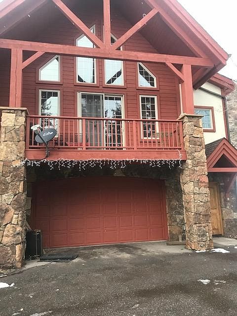 End unit with oversized 2 car garage and balcony