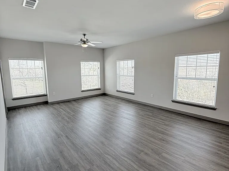 Living Room with Natural Light and Ceiling Fan