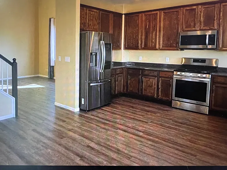 See-thru refrigerator door. The living room is at far left.