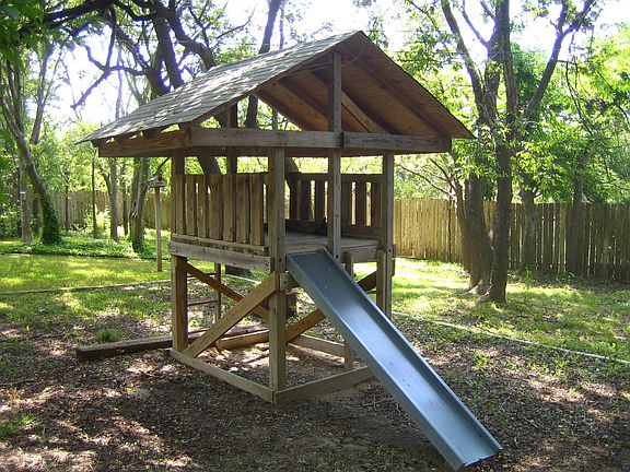 Spacious Tree-Enveloped Back Yard